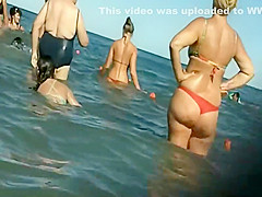Perfect girl steps out of the water