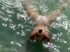 Dainty girl in beach cabin