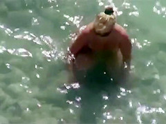 Dainty girl in beach cabin