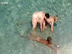 Mature nudist women in the water
