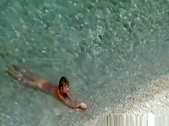 Mature nudist women in the water
