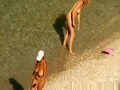 Mature nudist women in the water