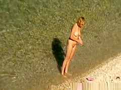 Mature nudist women in the water