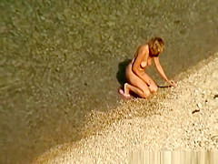 Mature nudist women in the water