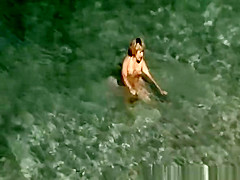Mature nudist women in the water