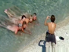 Mature nudist women in the water