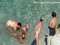 Mature nudist women in the water