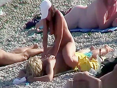 Nude woman puts lotion and massages backs