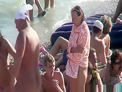 Nude woman puts lotion and massages backs