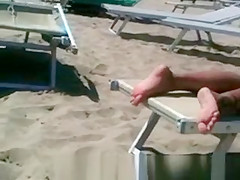Big ass milf on the beach