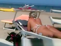 Big ass milf on the beach
