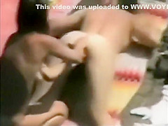 Lesbian girls caught fingering on a beach