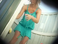 Awesome pussy caught in a beach cabin