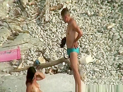Guy takes pictures of hot brunette nudist