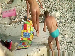 Guy takes pictures of hot brunette nudist