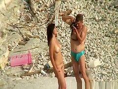 Guy takes pictures of hot brunette nudist