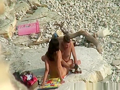 Guy takes pictures of hot brunette nudist