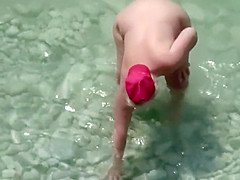 Big ass during playful water wrestling
