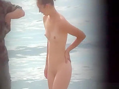Nerd nudist naked at beach
