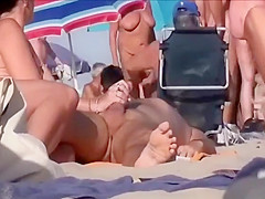 Horny mature nudists at a beach