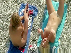 Two nude women with shaved pussies