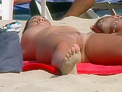 Spread legs revealing her beefy pussy