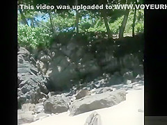 Voyeur secretly films woman in bikini sunbathing