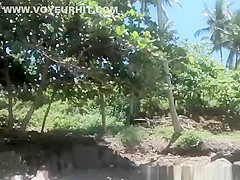 Voyeur secretly films woman in bikini sunbathing