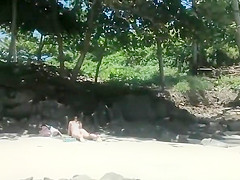 Voyeur secretly films woman in bikini sunbathing