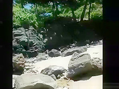 Voyeur secretly films woman in bikini sunbathing