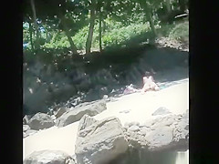 Voyeur secretly films woman in bikini sunbathing