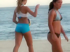Girls playing volleyball in a tight bikini