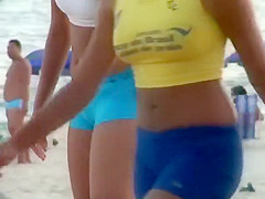 Girls playing volleyball in a tight bikini