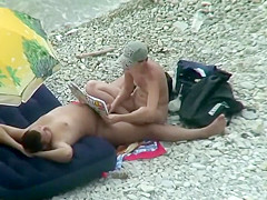 She reads and strokes his dick