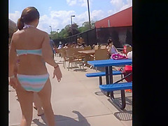 Gorgeous girl in a loose bikini