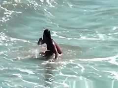 Nudist women in the water