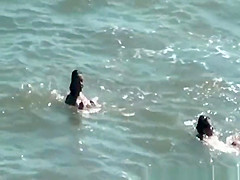 Nudist women in the water