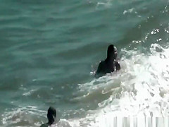 Nudist women in the water