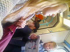 Curly haired nudist on the beach