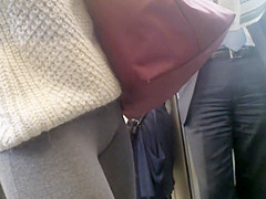 Curly haired nudist on the beach