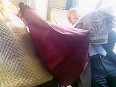 Curly haired nudist on the beach