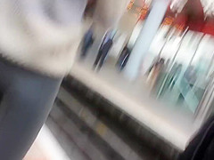 Curly haired nudist on the beach