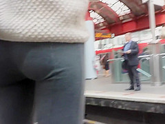 Curly haired nudist on the beach