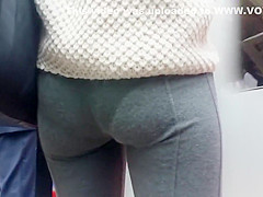 Curly haired nudist on the beach