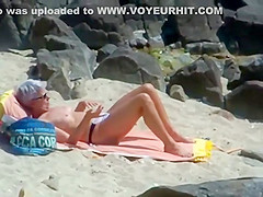 Peeping on a sun tanning woman