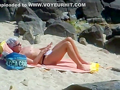 Peeping on a sun tanning woman