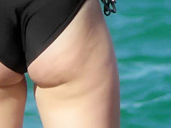 Hot teen girl having fun on the beach