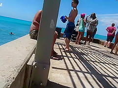 I wanted to wipe sand off her butt
