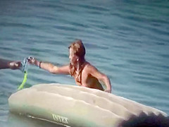 Nudist lady prepares for a dive