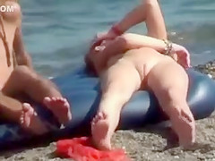 Nude hippie girl on an air mattress